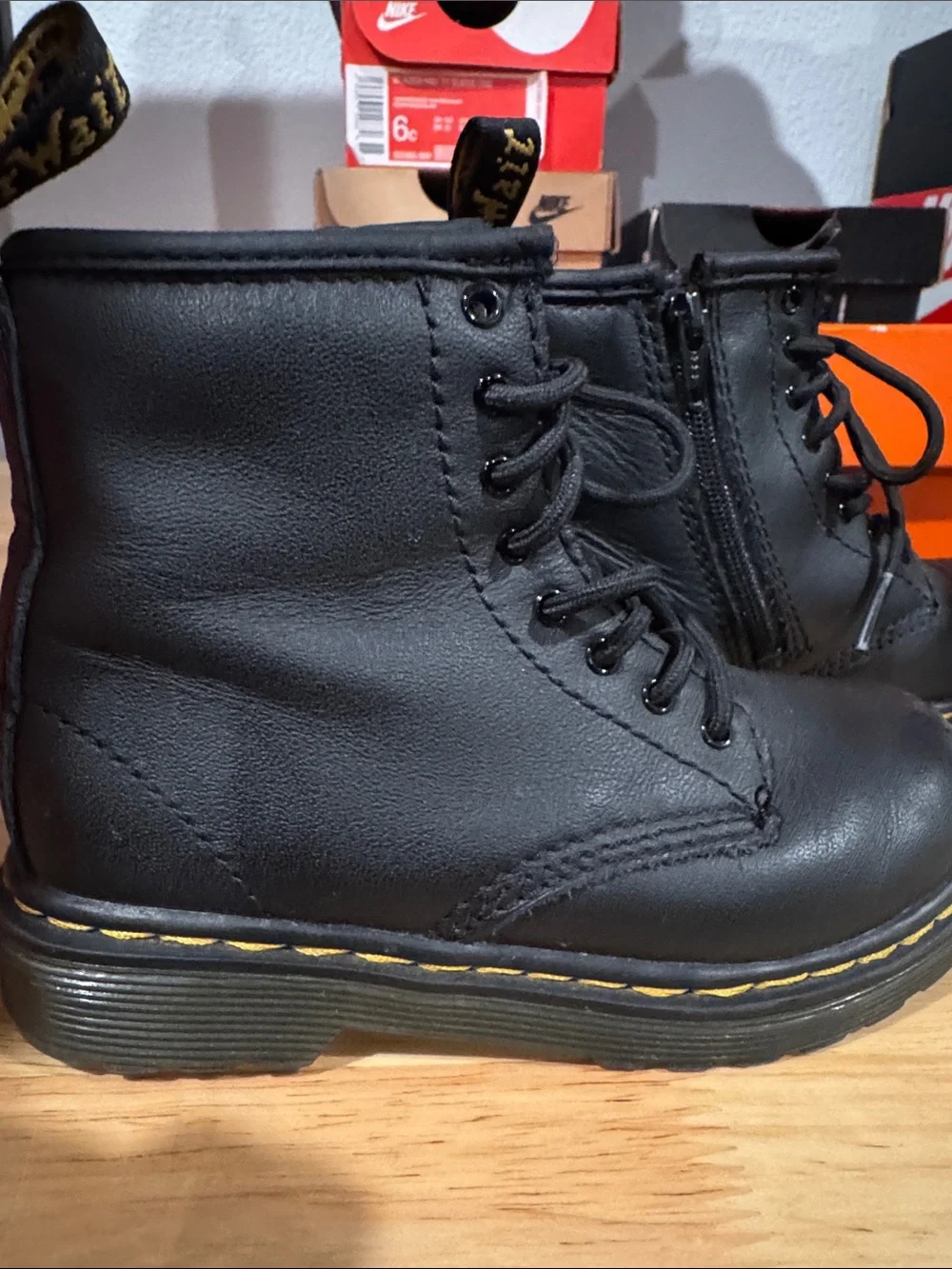 Dr. Martens Kids Black Leather Lace-Up Boots with Yellow Stitching